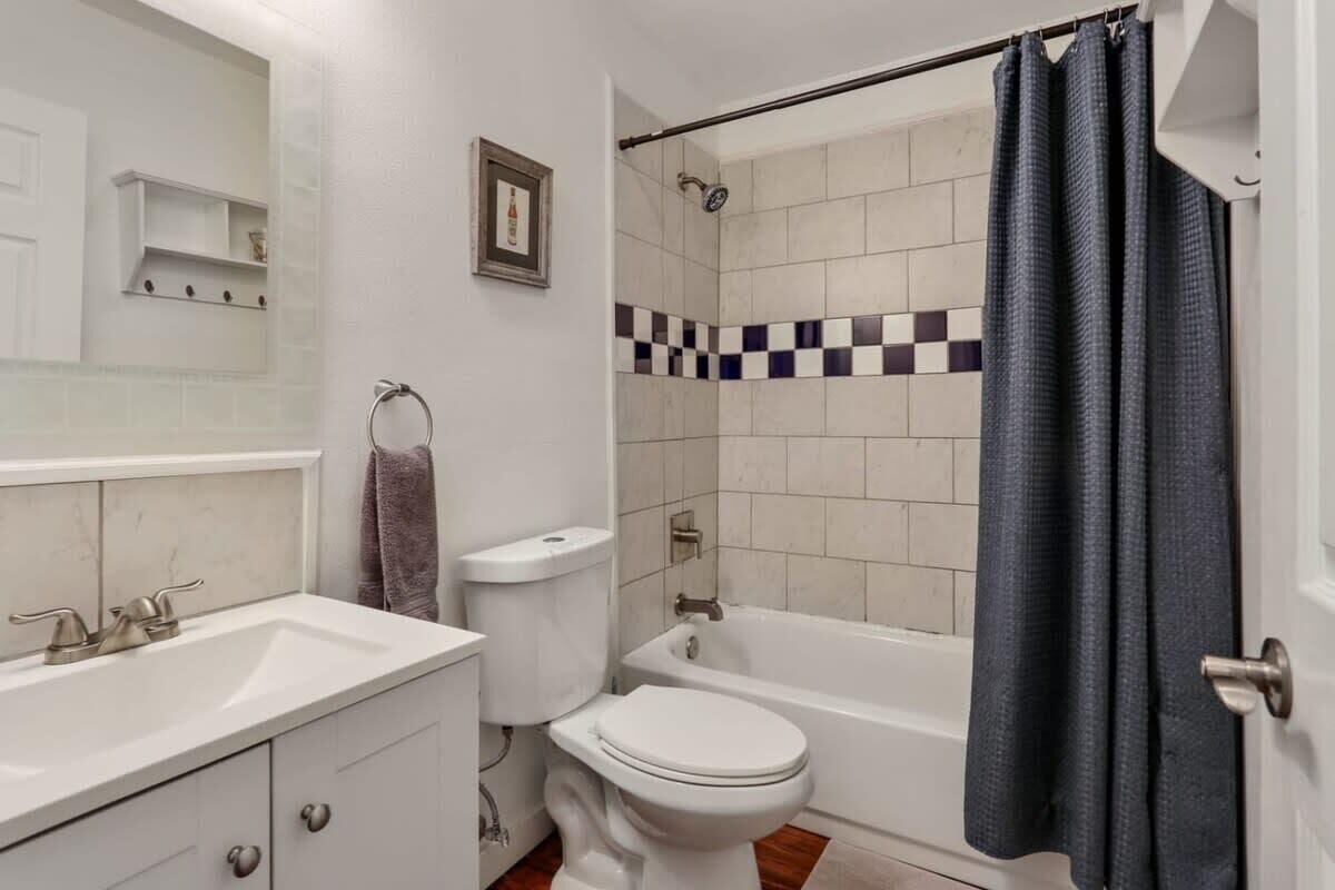 Bathtub, hair dryer, towels