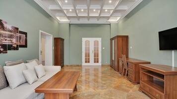 Departamento Deluxe | Área de sala de estar | Televisión LED