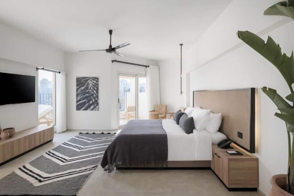 2 habitaciones, minibar y caja de seguridad en la habitación