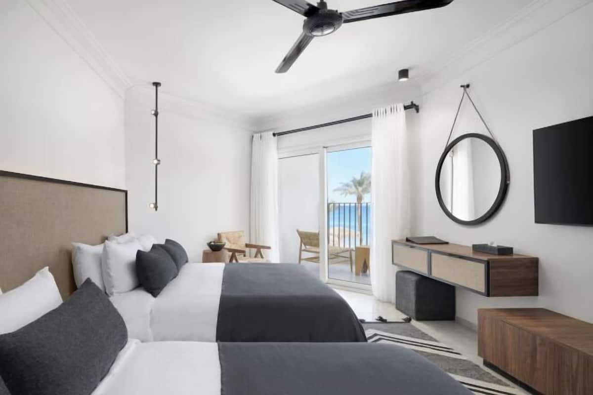 2 habitaciones, minibar y caja de seguridad en la habitación