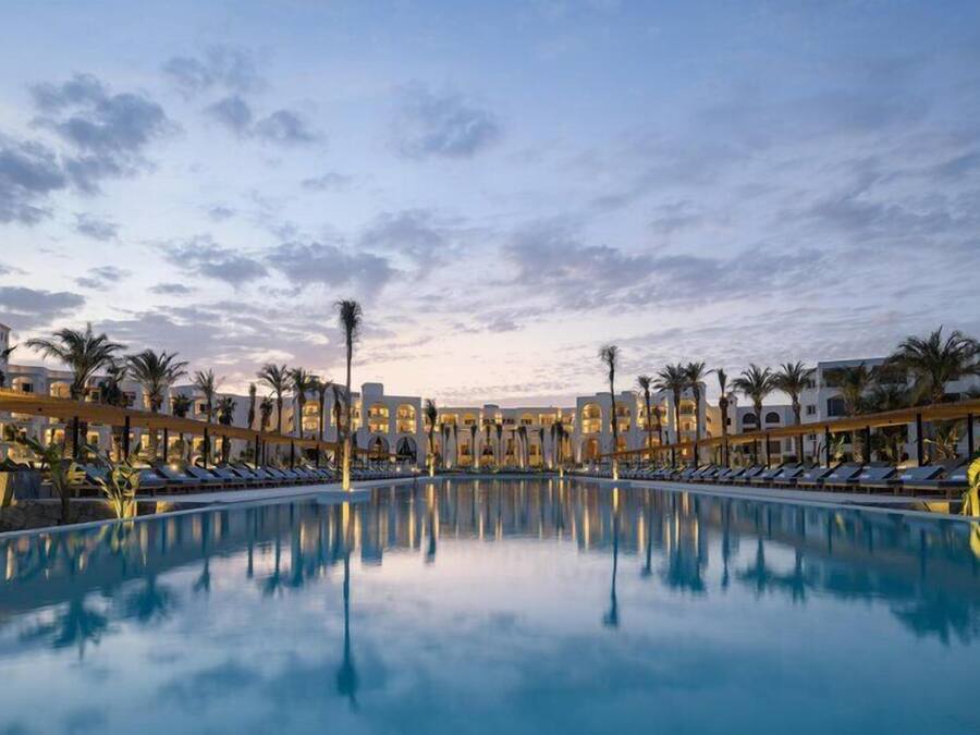 2 outdoor pools, pool umbrellas, pool loungers