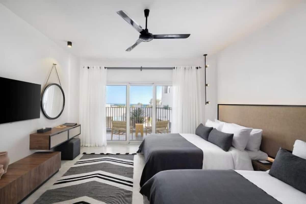 2 habitaciones, minibar y caja de seguridad en la habitación