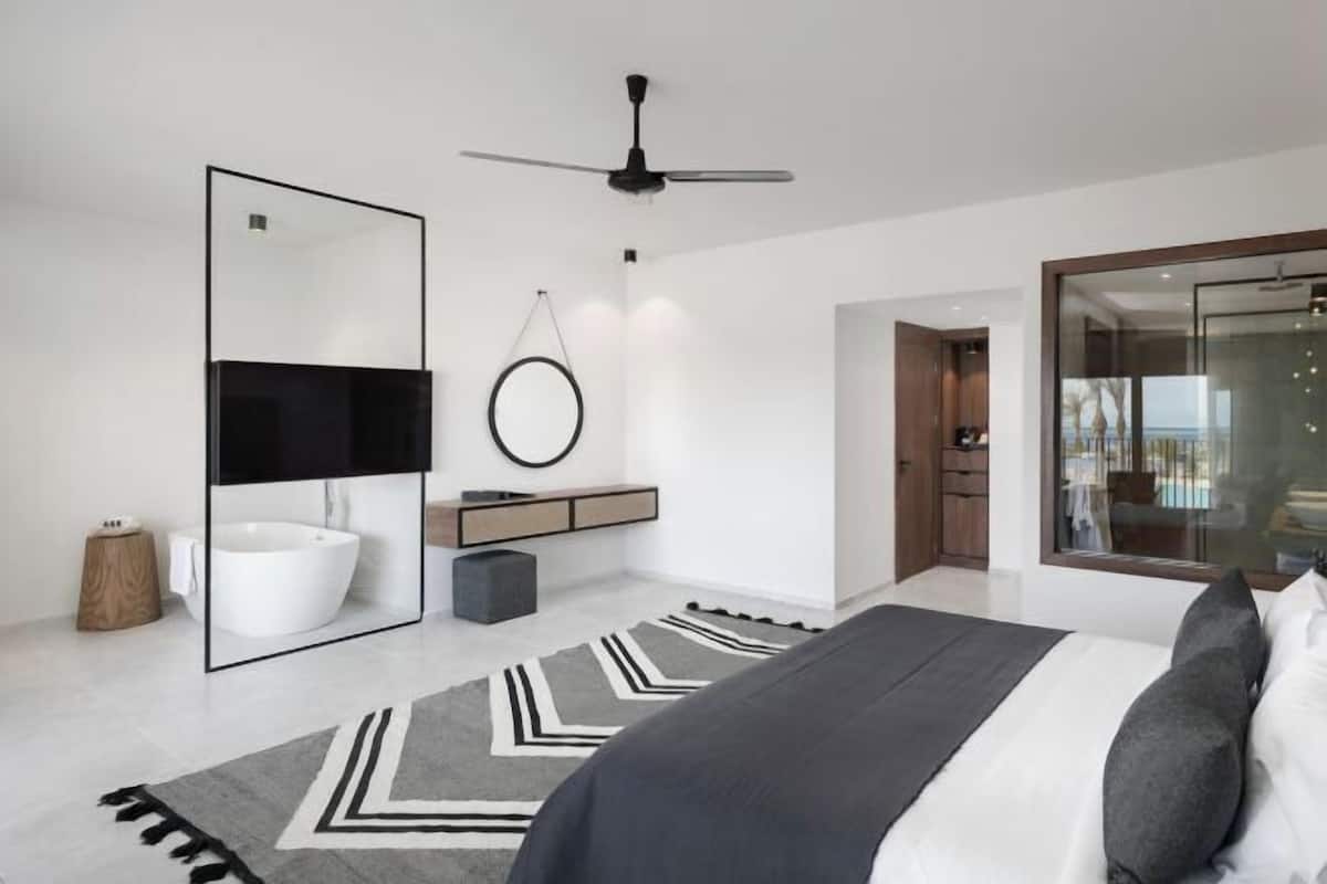 2 habitaciones, minibar y caja de seguridad en la habitación