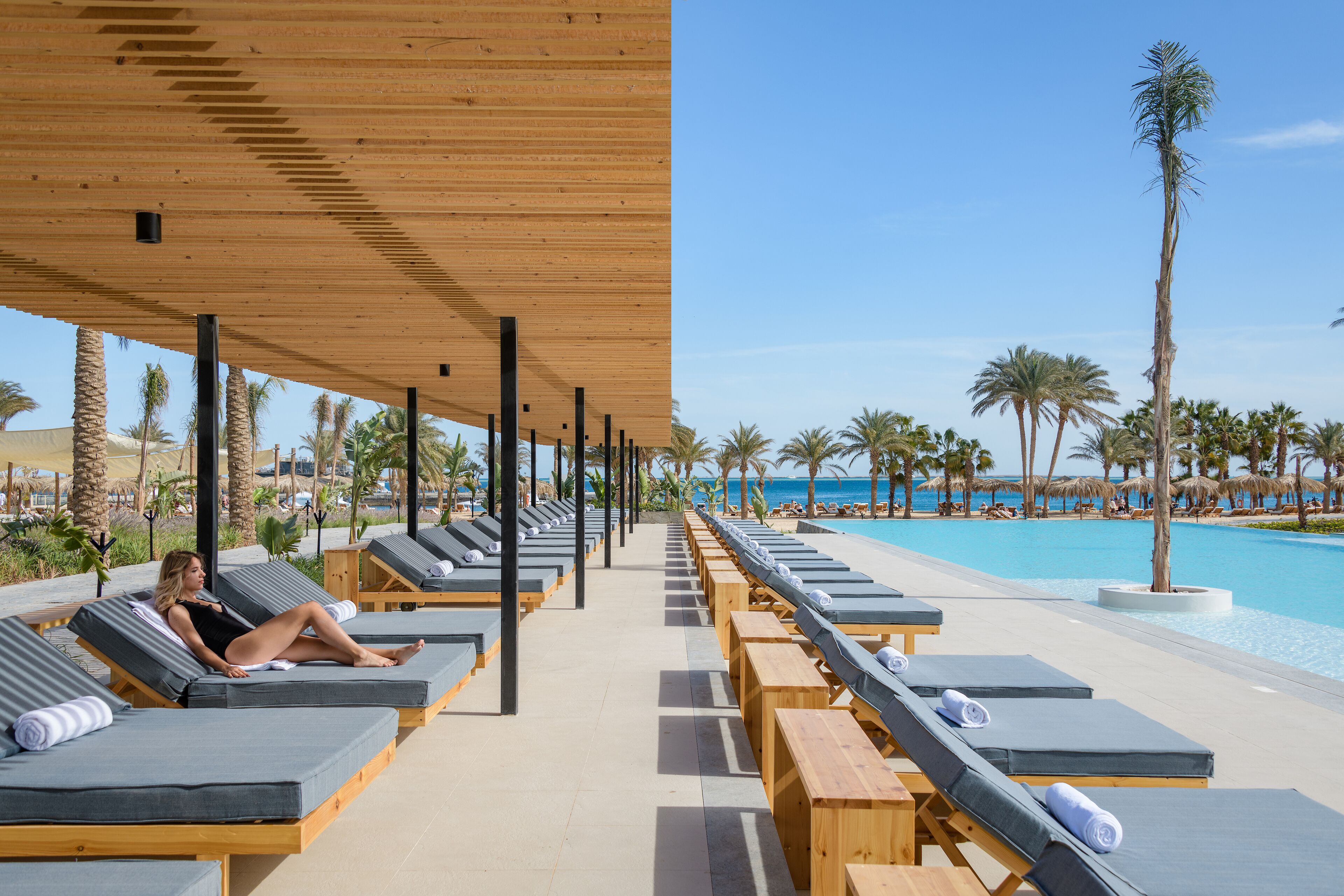 2 outdoor pools, pool umbrellas, pool loungers