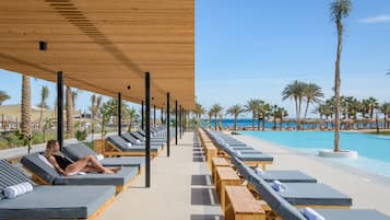 2 outdoor pools, pool umbrellas, pool loungers