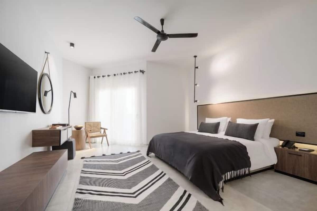 2 habitaciones, minibar y caja de seguridad en la habitación
