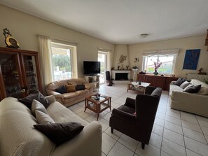 TV, fireplace - Two-Bedroom Villa Reina with Private Outdoor Pool on Vouliagmeni Hill (Vouliagmeni)
