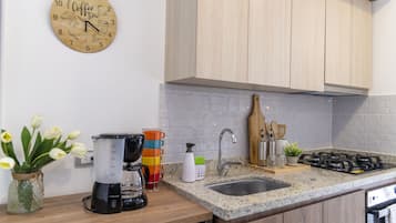Mini-fridge, blender, griddle, cookware/dishes/utensils