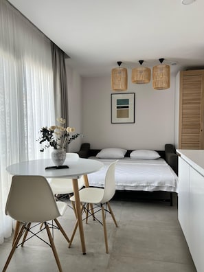 Junior Suite, 1 King Bed | Living area | 43-inch LED TV with satellite channels, TV