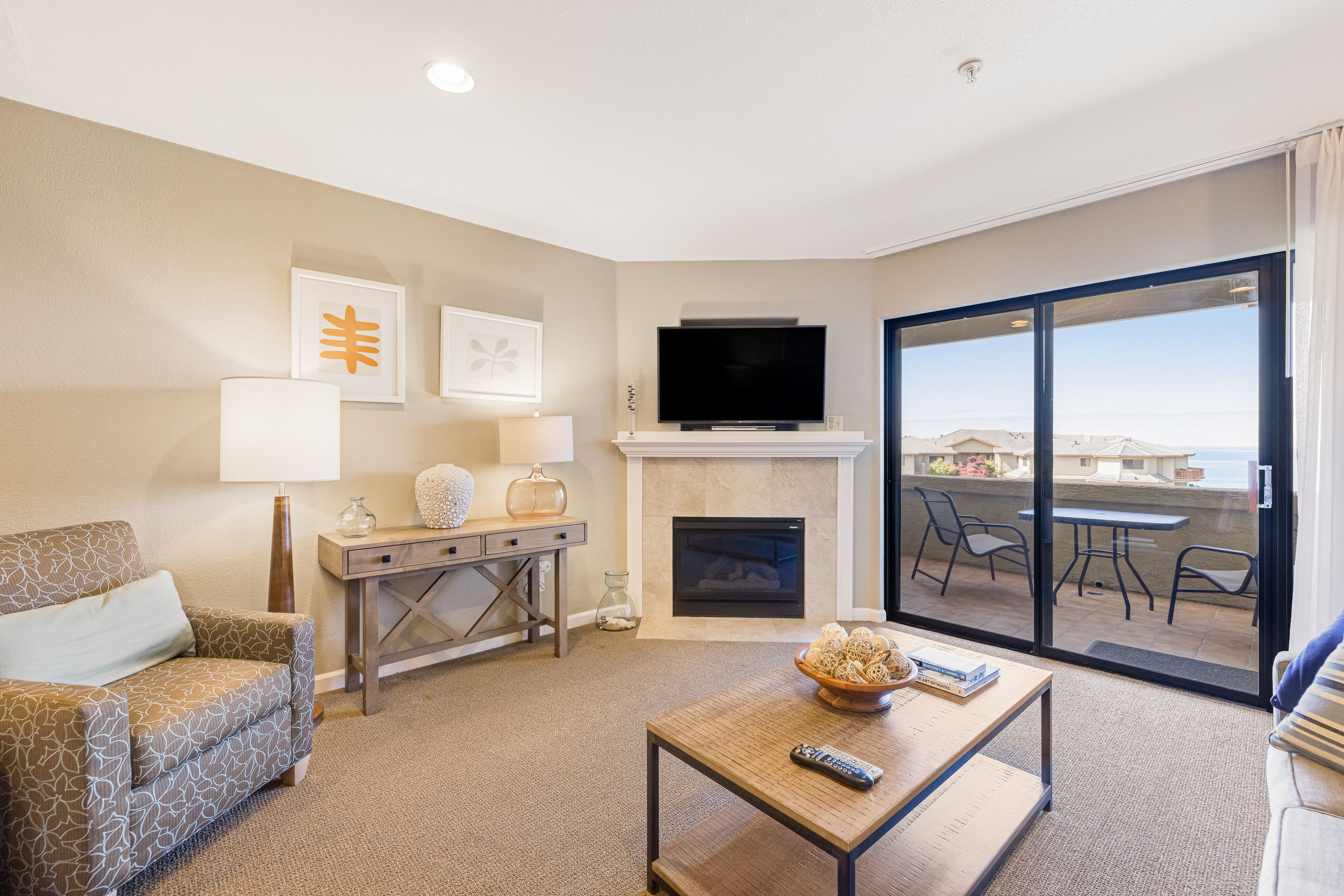 Ocean-view condo with hot tub, heated pool, beach access, balcony, grill, sauna