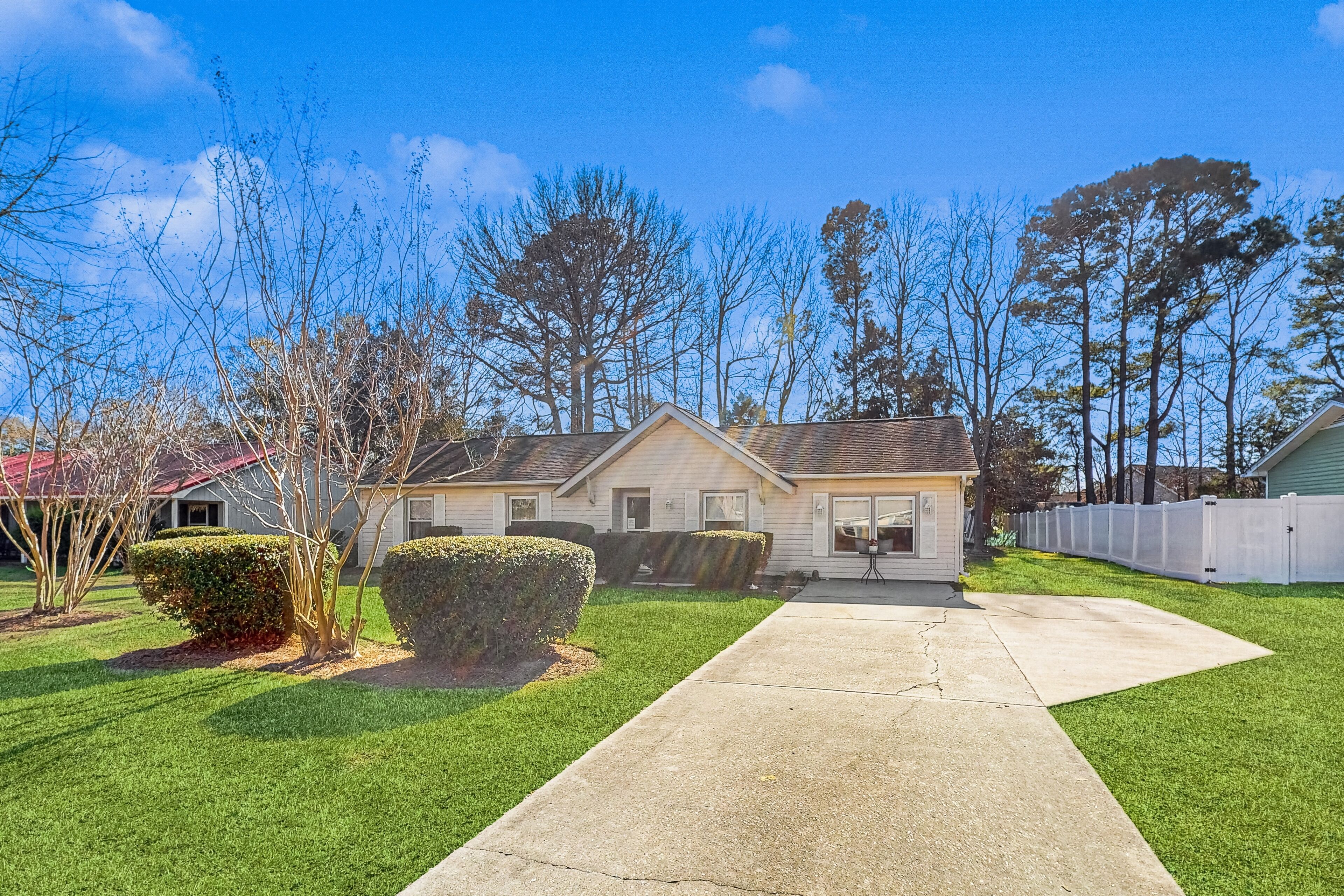 Lovely home approx. 1 mile from the beach with sunroom & playset, dog-friendly