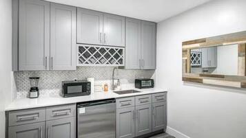 Fridge, microwave, coffee/tea maker, toaster