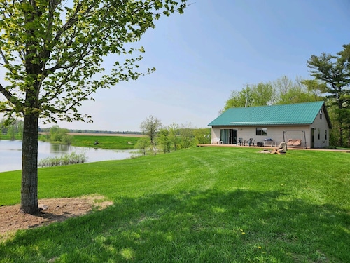 Peacefully secluded cabin on a small private lake with 55 Acres