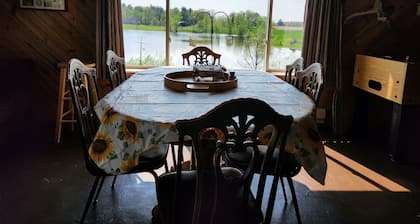 Peacefully secluded cabin on a small private lake with 55 Acres