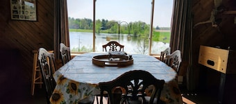 Peacefully secluded cabin on a small private lake with 55 Acres