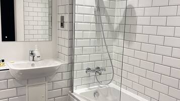 Hair dryer, towels, soap, shampoo