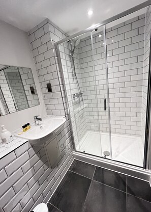 Hair dryer, towels, soap, shampoo