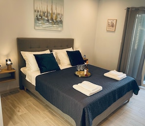 2 bedrooms, in-room safe, iron/ironing board, travel cot