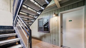 A staircase leading to a room with a door marked 'G'. - Edelweiss Haus G | Hot Tub | Pool | Kitchen | Walk to Slopes (Park City)
