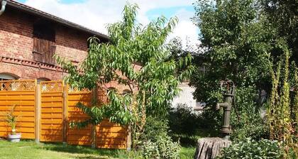 Apartment in a farmhouse with idyllic courtyard and natural garden