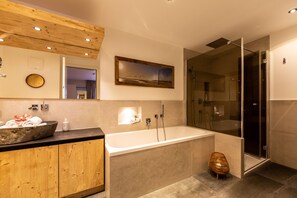 Bathtub, hair dryer, towels