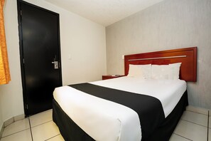 Basic Single Room | Down comforters, Select Comfort beds, in-room safe, blackout drapes