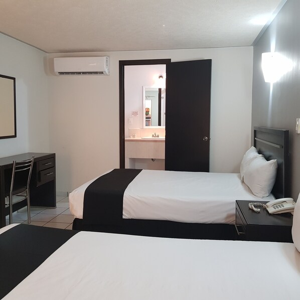 Basic Double Room | Down comforters, Select Comfort beds, in-room safe, blackout drapes