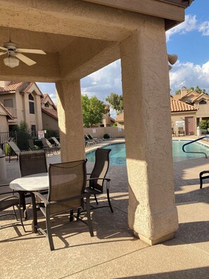 Outdoor pool, a heated pool - Newly decorated 2 bedroom, 2 bath condo with 2 heated community pools. (Mesa)