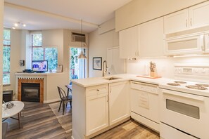 Condo, 1 Queen Bed with Sofa bed, Balcony, Pool View | Private kitchen | Fridge, microwave, oven, stovetop