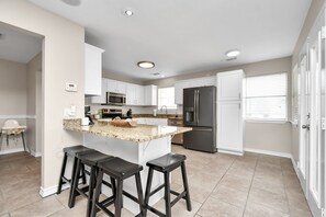 Fridge, microwave, oven, stovetop - Family Get Away-Lake Conroe Pool & Big Yard With King Bed (Willis)