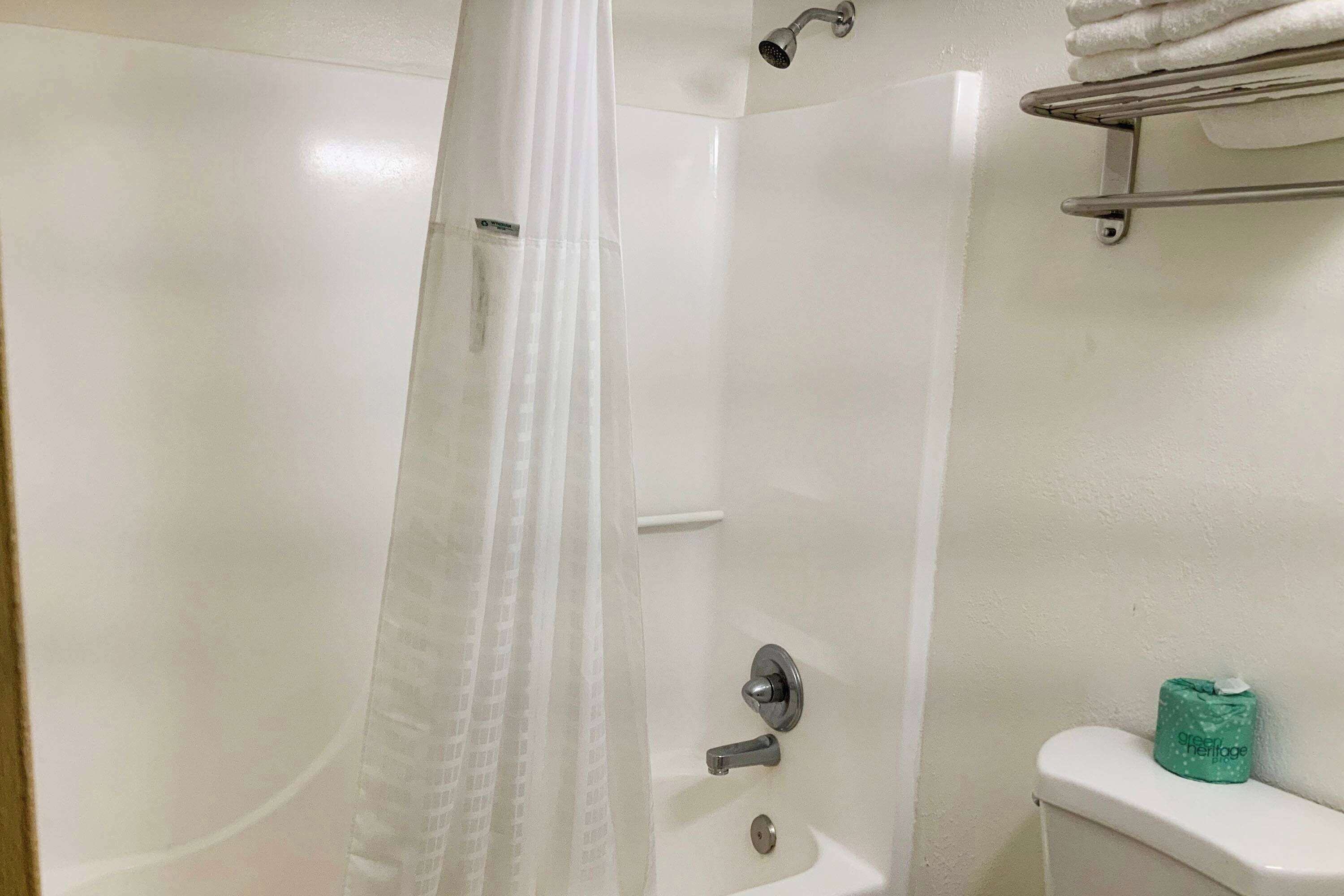 Combined shower/bathtub, hair dryer, towels, soap