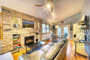Smart TV, fireplace, books