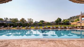 Seasonal outdoor pool, pool umbrellas, pool loungers