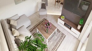 A modern living room with a sofa, coffee table, and a TV stand. - Apartments Villa Subic - Two Bedroom Apartment with Balcony A2 (Kampor)