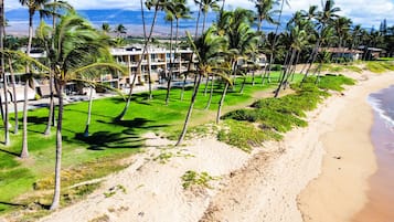 On the beach, sun loungers, beach towels