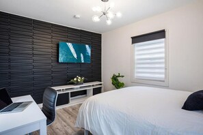 4 bedrooms, desk, iron/ironing board, travel crib