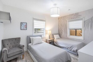 4 bedrooms, desk, iron/ironing board, travel cot