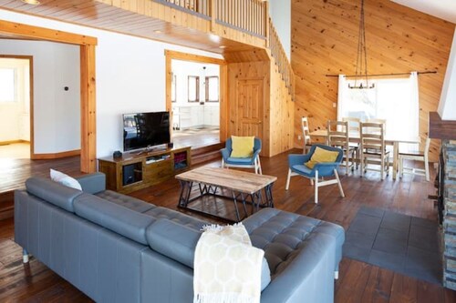 Lake Stuckley country home nestled into Mont Orford