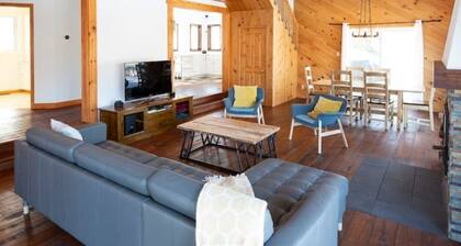 Lake Stuckley country home nestled into Mont Orford