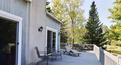 Lake Stuckley country home nestled into Mont Orford
