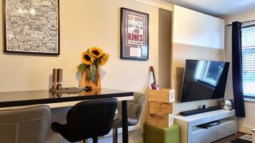 Classic Apartment, 1 Bedroom | Living area | Flat-screen TV