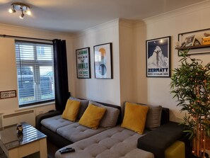 Departamento clásico, 1 habitación | Área de sala de estar | Televisión de pantalla plana