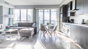 A modern apartment with a living room, dining area, and kitchen. - GLOBALSTAY.  Design 26Floor Downtown Apartment (Toronto/Canada)