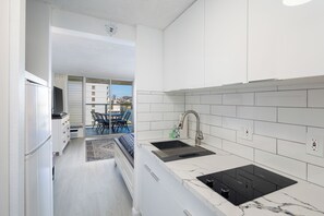 Fridge, microwave, coffee/tea maker, toaster