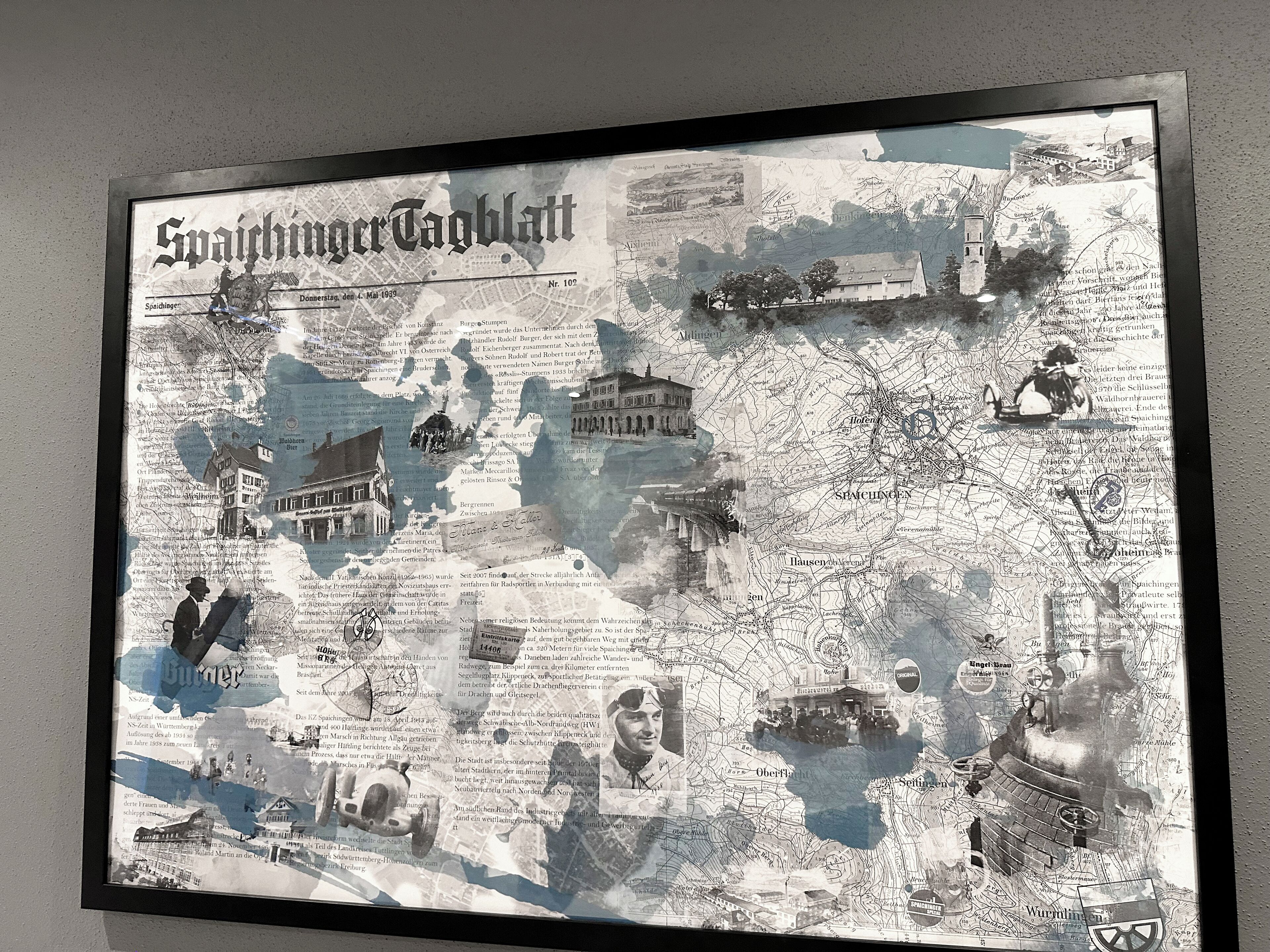 A framed map with historical annotations and illustrations of buildings and landmarks.