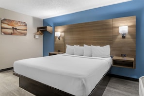 Standard Room, 1 King Bed, Non Smoking, Kitchenette | 1 bedroom, desk, laptop workspace, bed sheets