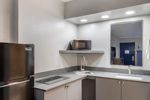 Standard Room, 1 King Bed, Non Smoking, Kitchenette | 1 bedroom, desk, laptop workspace, bed sheets
