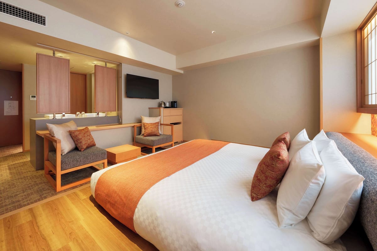 Chambre Deluxe, 1 trĂšs grand lit, non-fumeur, baignoire