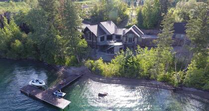 Lakefront home with boat dock & private hot tub!