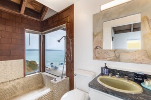 Bathtub, hair dryer, towels